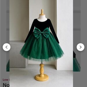 Elegant Green and Black Dress with Bow